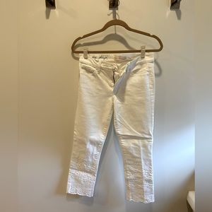 Tory Burch white jeans with ankle detail.